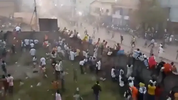 Dozens killed in crowd crush at Guinea soccer match.